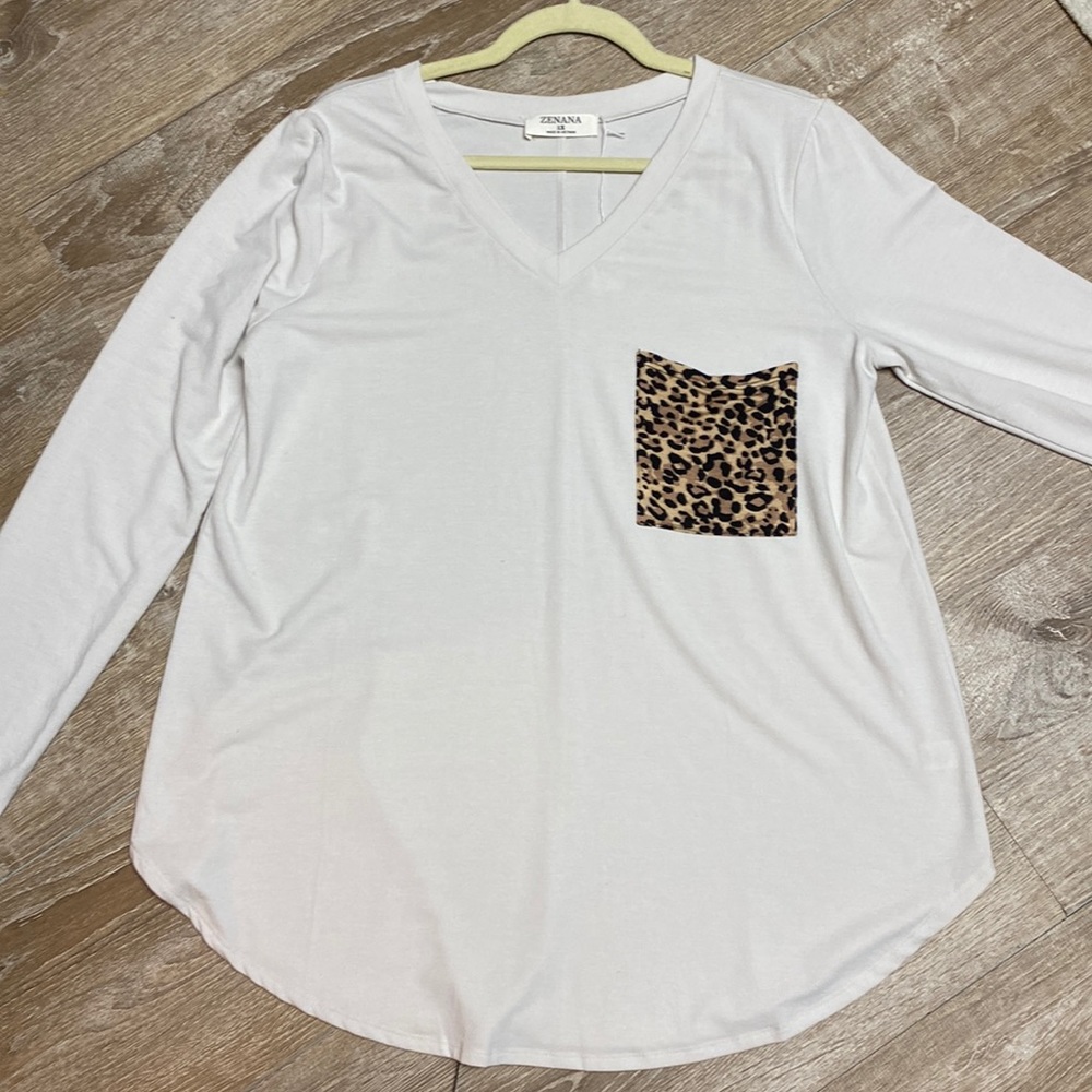 Zenana off white, v-neck, long-sleeve top w/ leopard pocket &rounded hemline